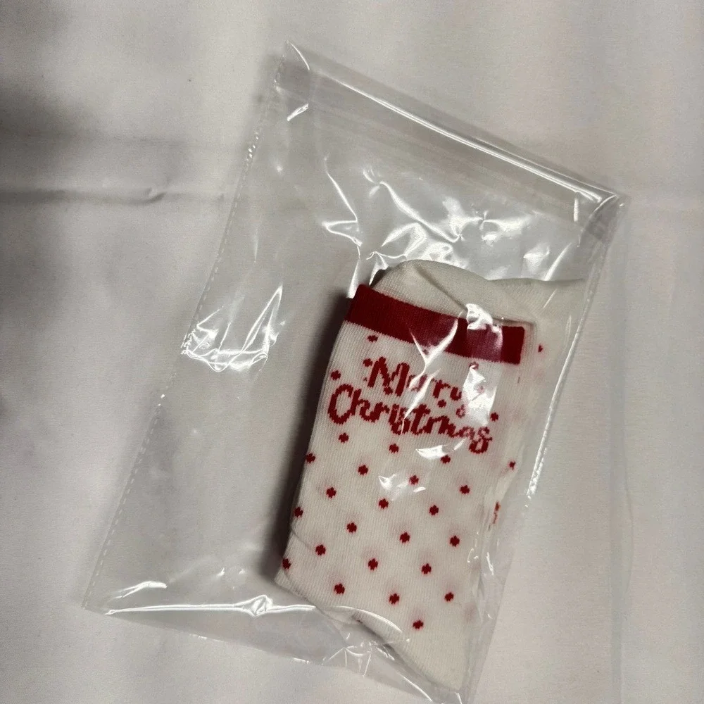Women's Christmas-themed crew socks NEW in Bag.‎